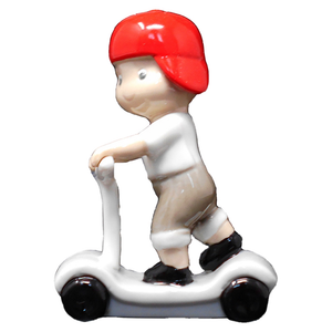 Bomboniera Statuina Bimbo Hip Hop in Porcellana Assortito in 2 Figure Ilary Queen - Iq3373